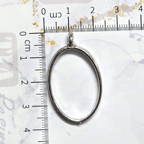 Close up of Resin Art Pendant Earrings